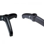 Two black base supports with index levellers on a light grey background