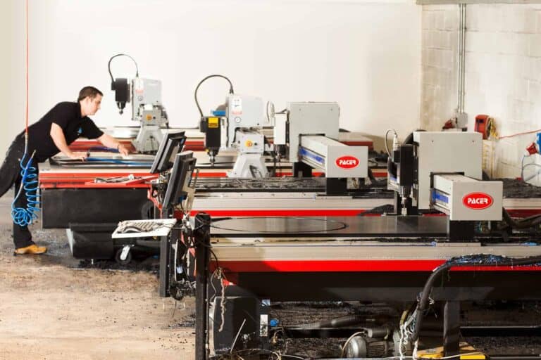 Laser cutting machines in a manufacturing workshop at SL Plastics.