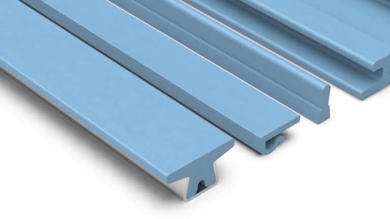 Extrusion plastic profiles in blue for construction and manufacturing.